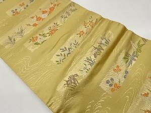 草花に流水模様織出し開き名古屋帯（額縁仕立て）